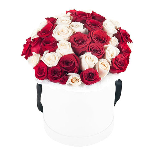 A box of red and white roses ― Floristik — flower delivery all over Ukraine