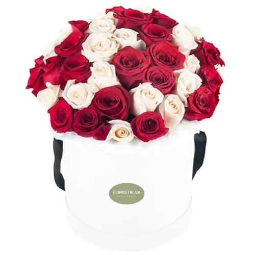 A box of red and white roses ― Floristik — flower delivery all over Ukraine